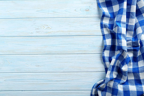 istock Napkin on blue wooden table, close up 523832818