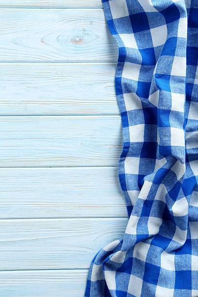 istock Napkin on blue wooden table, close up 523832904