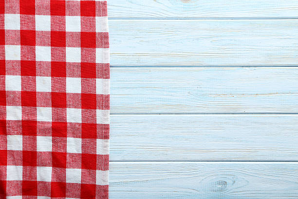 istock Napkin on blue wooden table, close up 523833564