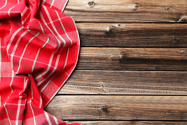 istock Napkin on brown wooden background 523834090
