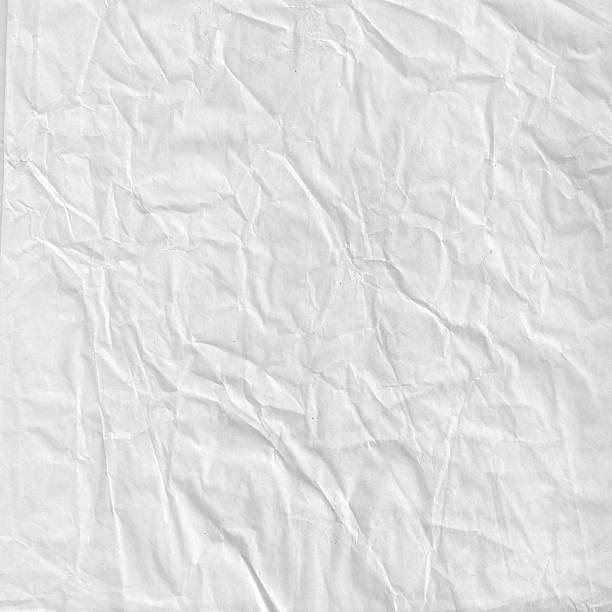 istock Crumpled paper sheet. Wrapping-paper texture. 523855602