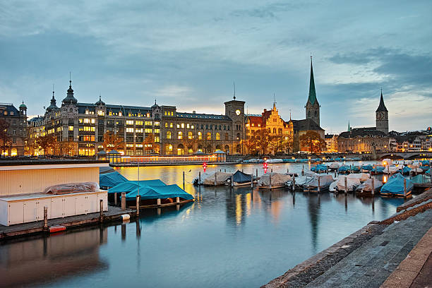 istock Night panoramic photo of Zurich and reflection in Limmat River 523856876