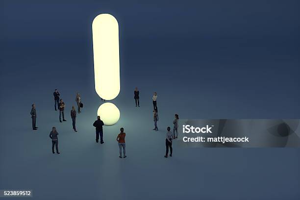 Group Of People Gathering Around A Glowing Exclamation Mark Stock Photo - Download Image Now