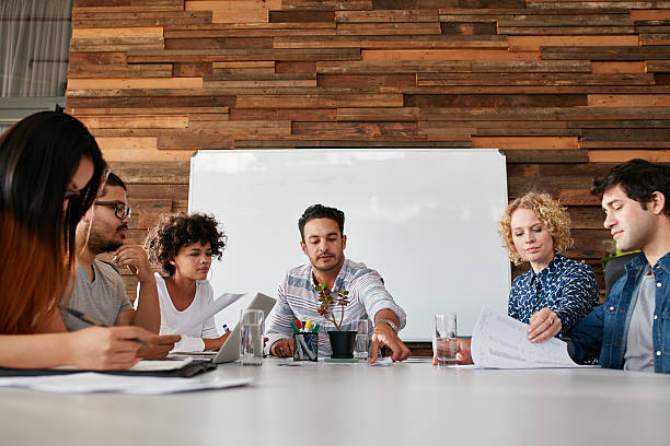 istock Team of young people having a meeting in office 523859862