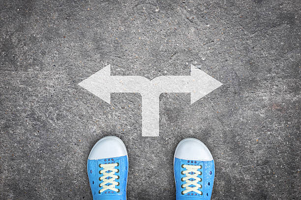 istock Blue shoes standing at the crossroad 523860008