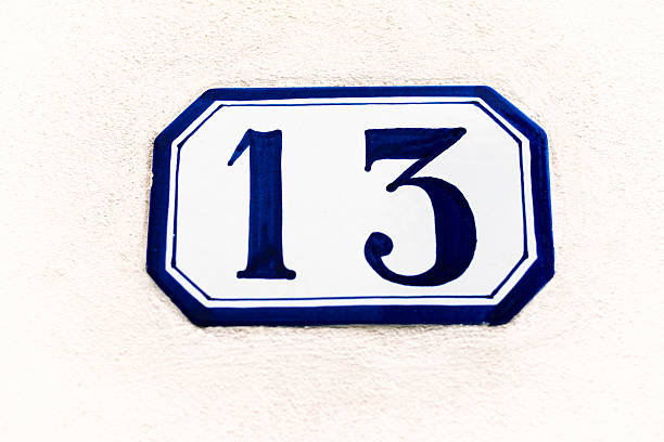 istock Ceramic Address Plaque Number 13 On White Wall 523861768