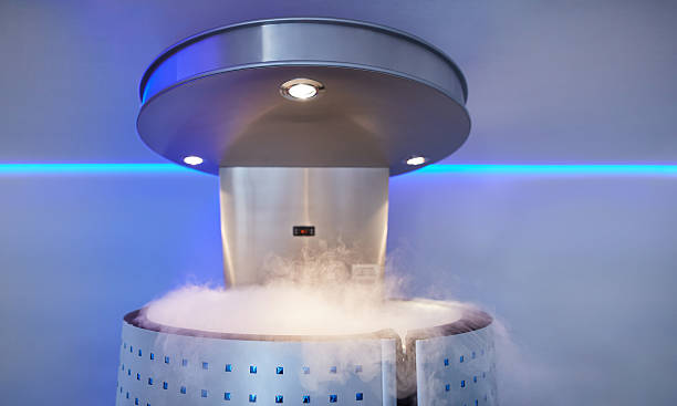 Whole body cryotherapy booth at clinic Cryotherapy capsule with cold nitrogen vapors in cosmetology clinic. Cryo sauna for whole body cryotherapy treatment. nitrogen photos stock pictures, royalty-free photos & images