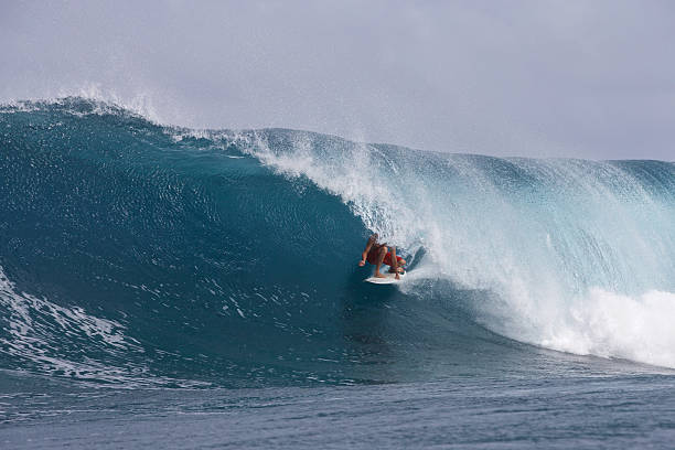 istock Surfer looks out from a big barrel 523862526