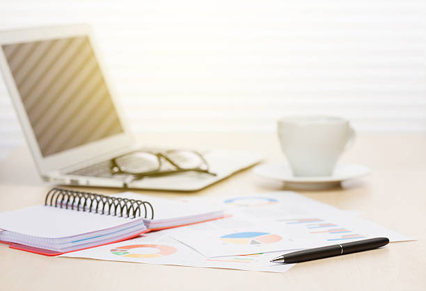 istock Office workplace with coffee, laptop and supplies 523862952