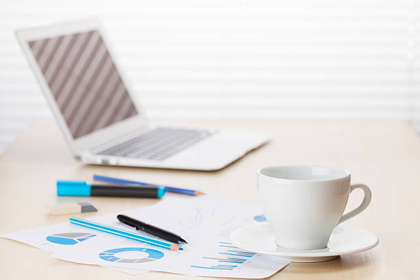istock Office workplace with with laptop and coffee 523863090