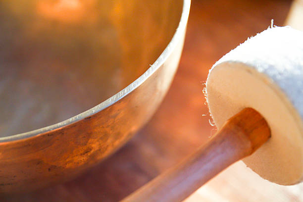 istock Tibetan bell and drumstick closely 523865022