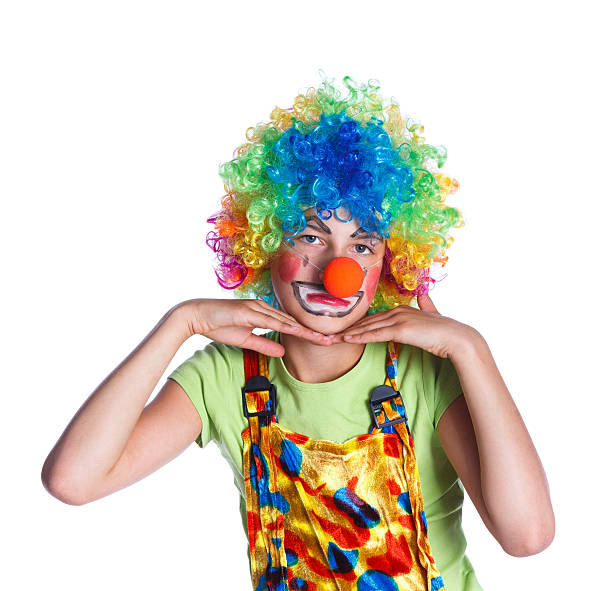 istock Girl dressed as a clown isolated 523865292