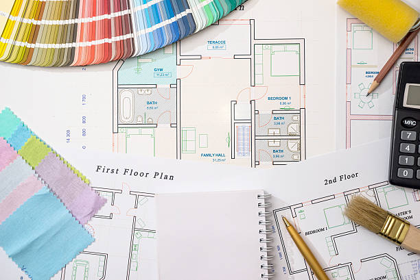 istock Color samples with house plan, calculator and pen 523865598