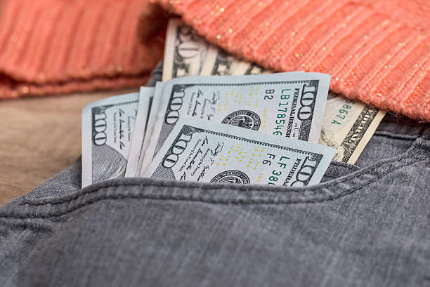 istock Dollar currency in jeans pocket ready for shopping 523866524