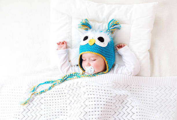 istock seven month old baby sleeping in the bed 523867254