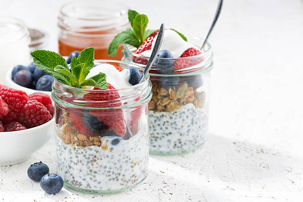 istock Breakfast in a jar with chia, berries and oat flakes 523868578