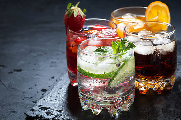 istock assortment of iced fruit drinks on a dark background 523869016