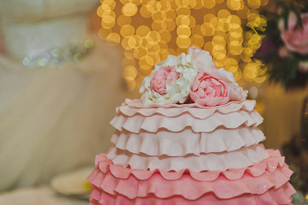 red roses and creamy whipped cream on a birthday cake