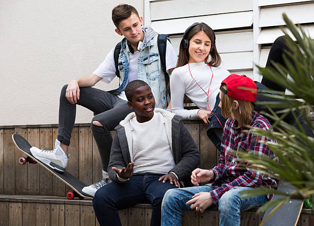 istock teens spending time together in sunny day 523869474