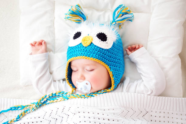 istock seven month old baby sleeping in the bed 523869850