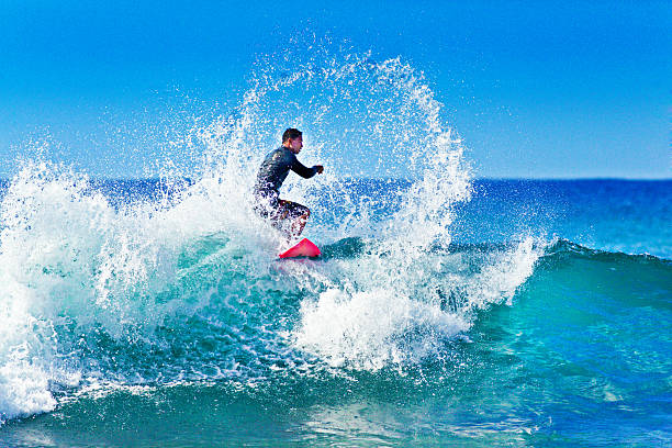 istock Surfing in Kauai Hawaii 523870058