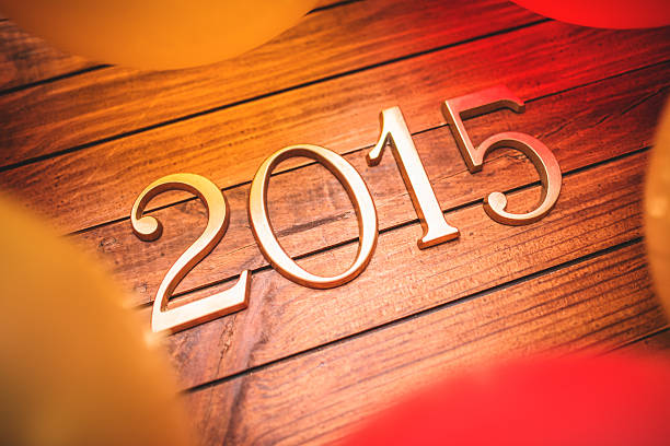 istock 2015 New year text on plank wood 523870353