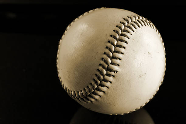 istock Close-up of a Baseball in Sepia 523870799