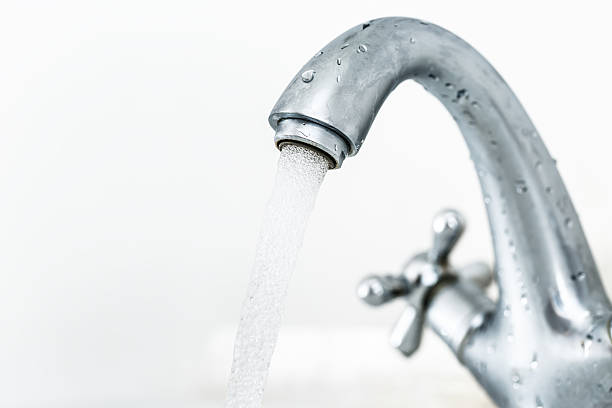 istock Running water tap closeup 523871282