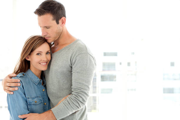 istock Happy woman hugged by lover 523871940