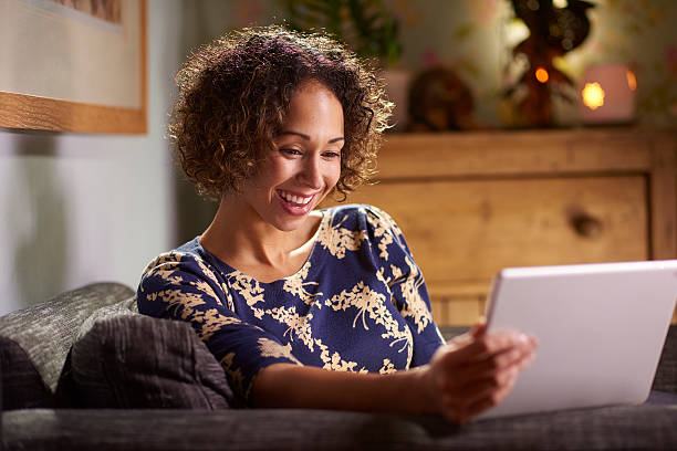 istock watching catch up tv on a tablet 523872170