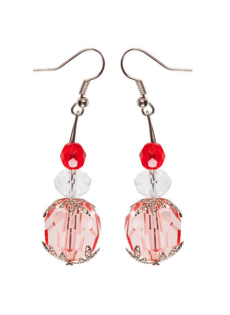 istock Earrings in red glass with silver elements. white background 523872786