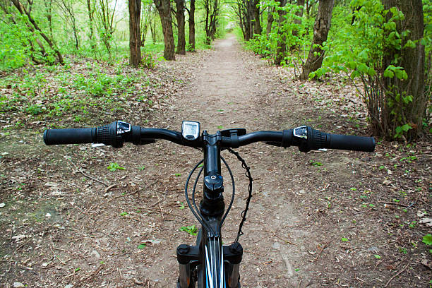 istock Mountain biking down hill descending fast on bicycle. 523873452