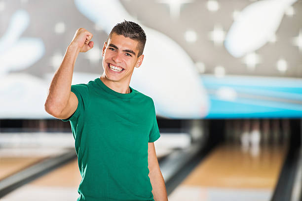 istock Cheerful man at bowling alley. 523874105