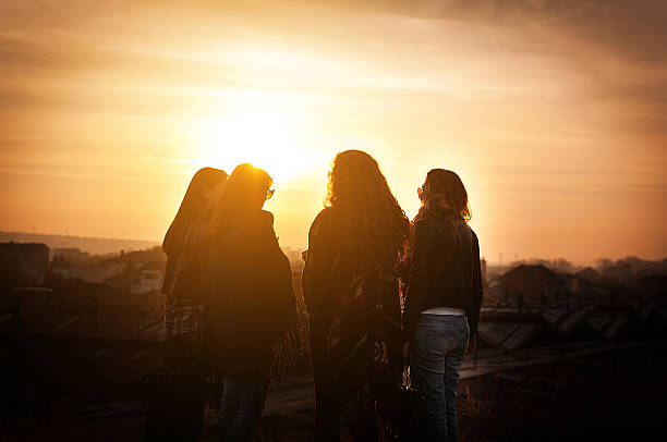 istock Group of beautiful woman at sunset 523874303