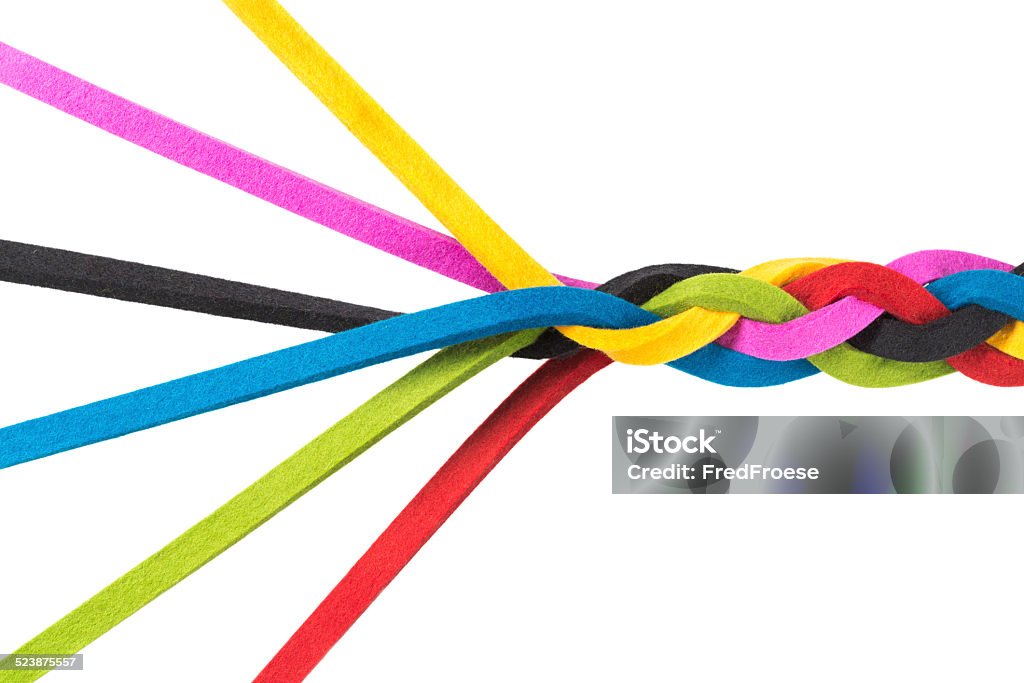 Connection, Merger, Teamwork Intertwined lines close up, isolated on white, concept for teamwork, relationship, networking Rope Stock Photo