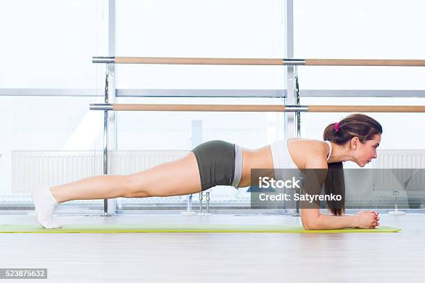 Training Fitness Woman Doing Plank Core Exercise Working Out For Stock Photo - Download Image Now