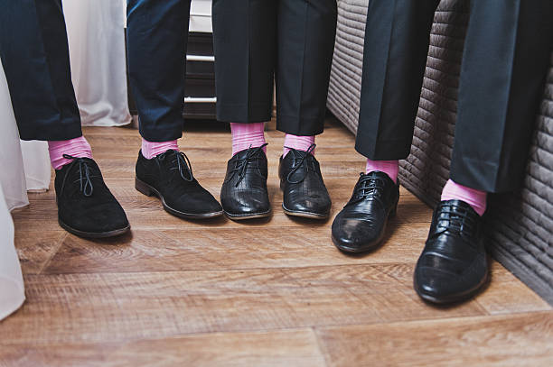 istock Pink socks on male feet 523876454