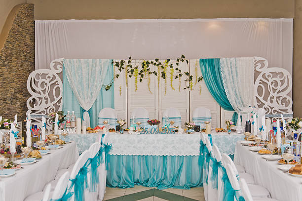 istock The hall is decorated with fabric covered the food tables 523876640