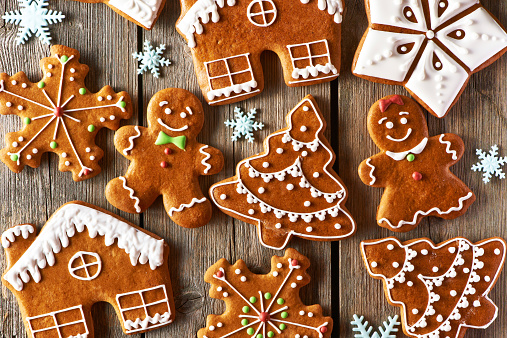 Christmas homemade gingerbread cookies on wooden table