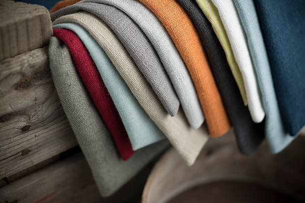 istock Layers of Folded Color Linen Hanging on Crate 523876802