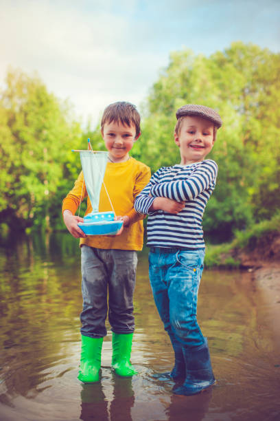 istock Children with toy ship 523876828