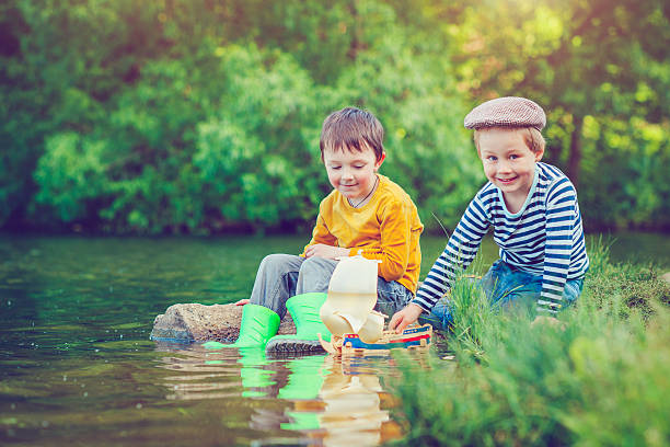 istock Children with toy ship 523876962