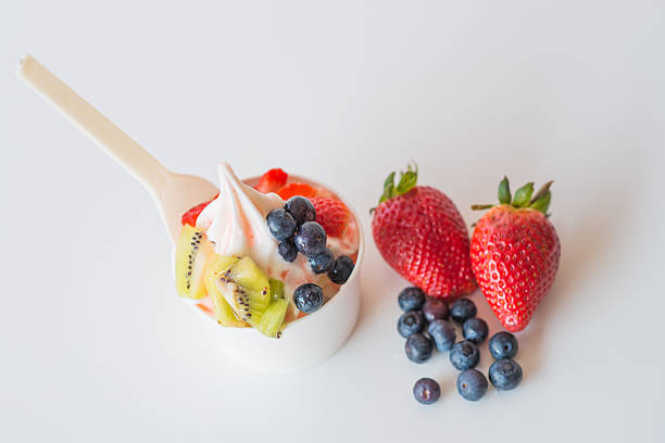 istock frozen yougurt in take away white cup 523877608