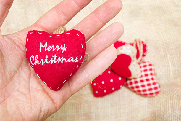 istock Christmas heart in hand 523877625