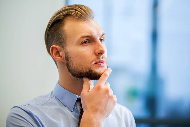 istock Young businessman in his office 523877754