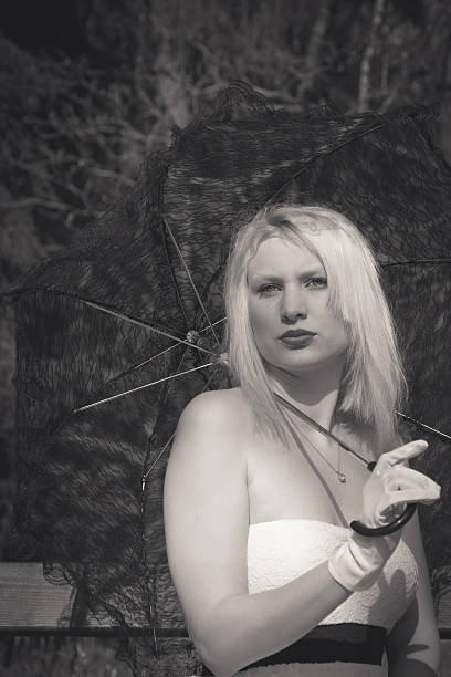 istock Woman with lace umbrella 523879158