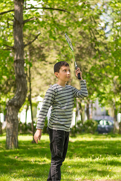 istock Young boy playing in the green nature 523885528