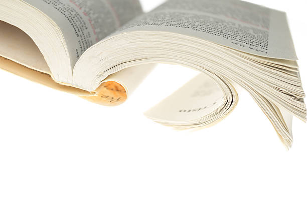 istock isolated open Gospel book on white background 523885562