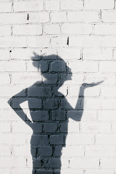 istock young woman Forming a Heart with Her Hands 523892403