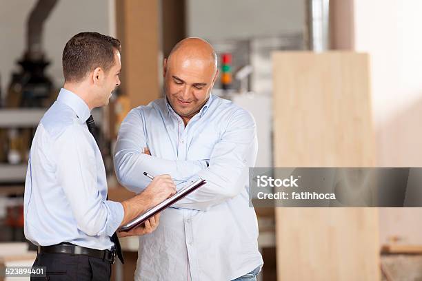 Small Businessman And Financial Advisor Stock Photo - Download Image Now - 30-39 Years, Adult, Adults Only